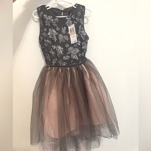 Brand new with tags. Pink & Violet Sz 7 girls dress with small train.